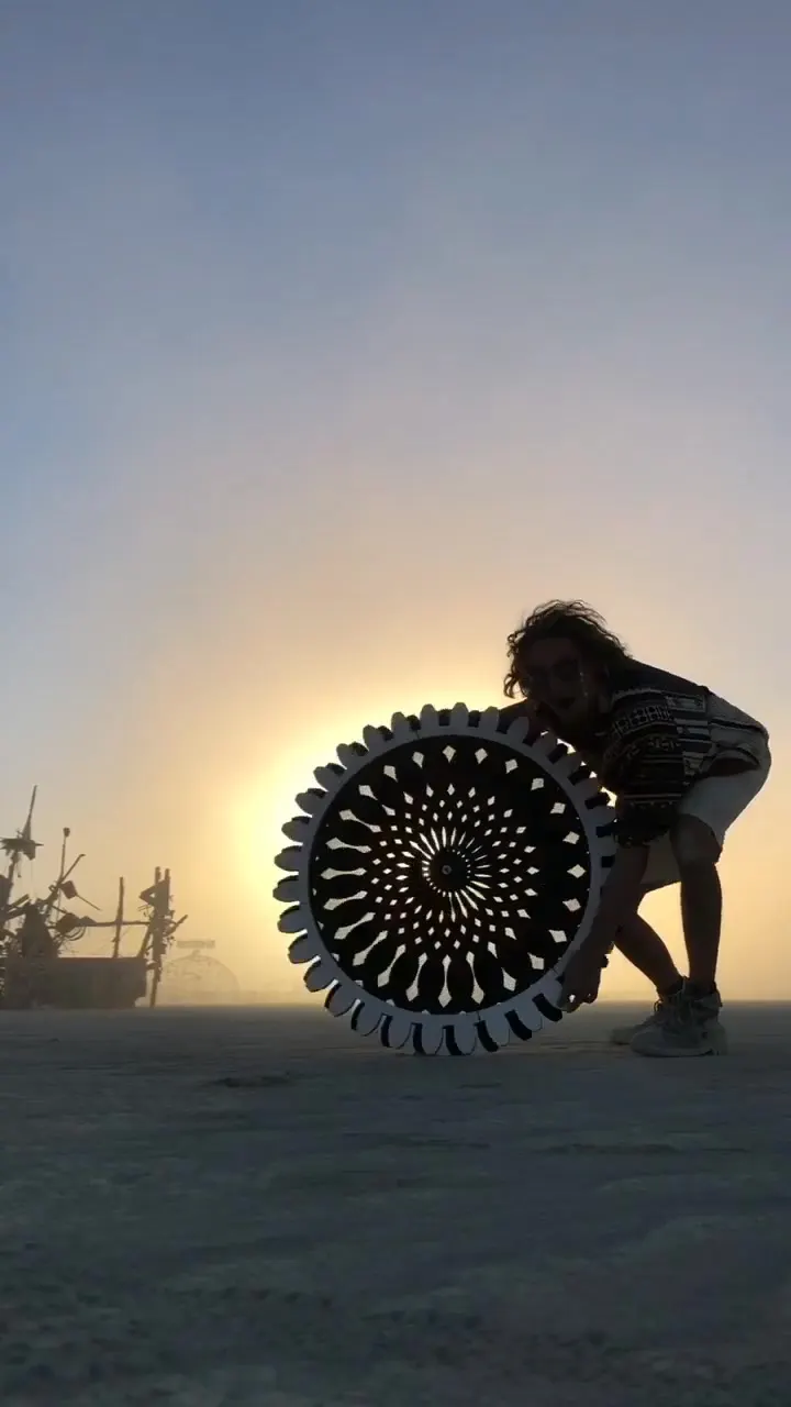 Burning Man – Kinetic wheels on the playa – illusions in the dust, from sunrise to deep into the night.